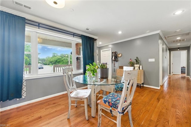 16 Inglewood Dr, Hampton, VA 23666 - dining room with crown molding, recessed lighting, and wood finished floors