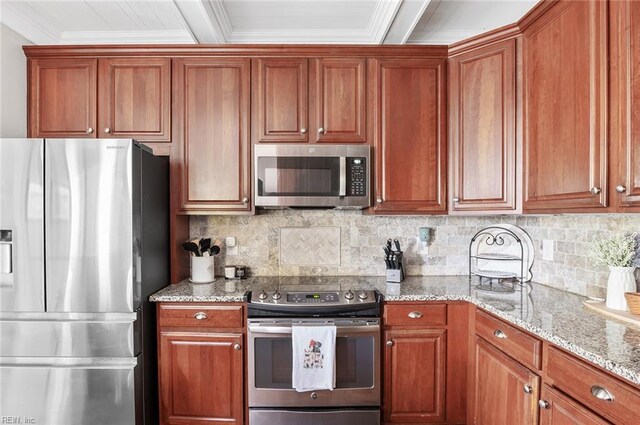 101 Ryder, Smithfield, VA 23430 - kitchen featuring appliances with stainless steel finishes, light stone counters, ornamental molding, backsplash, and brown cabinets