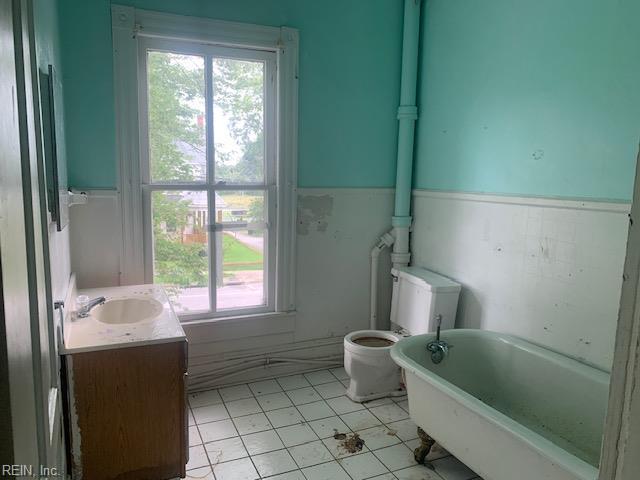 603 N High St, Franklin, VA 23851 - full bath featuring a bathtub, vanity, healthy amount of natural light, and tile patterned floors
