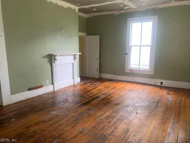 603 N High St, Franklin, VA 23851 - unfurnished room featuring wood-type flooring and baseboards