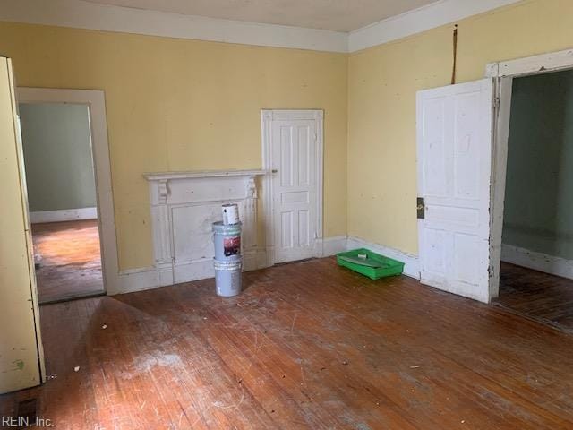 603 N High St, Franklin, VA 23851 - empty room featuring hardwood / wood-style flooring and baseboards