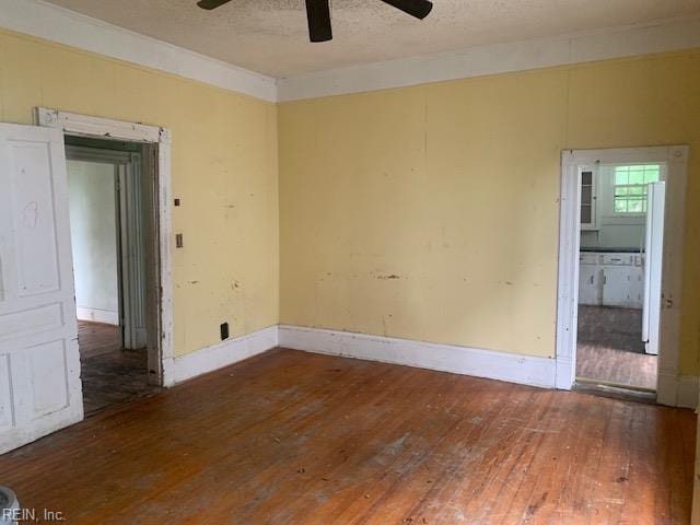 603 N High St, Franklin, VA 23851 - empty room with ceiling fan, hardwood / wood-style flooring, and a textured ceiling