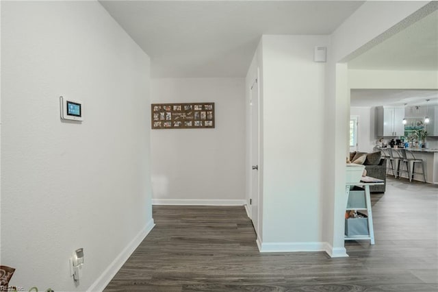 2028 Hickorywood Dr, Suffolk, VA 23434 - corridor featuring dark wood-style floors and baseboards