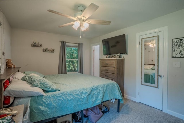 2028 Hickorywood Dr, Suffolk, VA 23434 - carpeted bedroom with baseboards and a ceiling fan