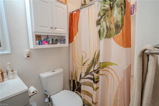 2028 Hickorywood Dr, Suffolk, VA 23434 - full bathroom featuring vanity, curtained shower, and a textured wall