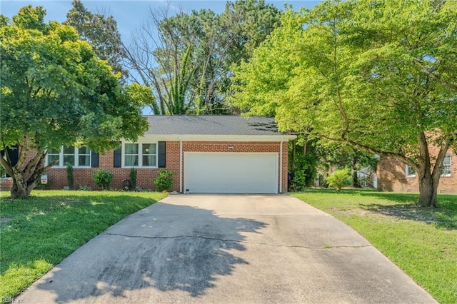 2028 Hickorywood Dr, Suffolk, VA 23434 - view of front of property featuring concrete driveway, an attached garage, brick siding, and a front lawn