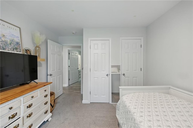 2601 Shell Rd, Hampton, VA 23661 - bedroom with light carpet and two closets