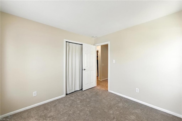 569 Chancery Ln, Virginia Beach, VA 23452 - unfurnished bedroom featuring carpet floors and a closet