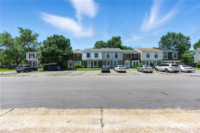 569 Chancery Ln, Virginia Beach, VA 23452 - view of front facade featuring uncovered parking and a residential view