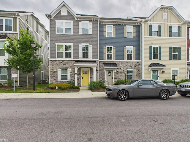 1732 Defiance Dr, Chesapeake, VA 23323 - townhome / multi-family property featuring stone siding and board and batten siding