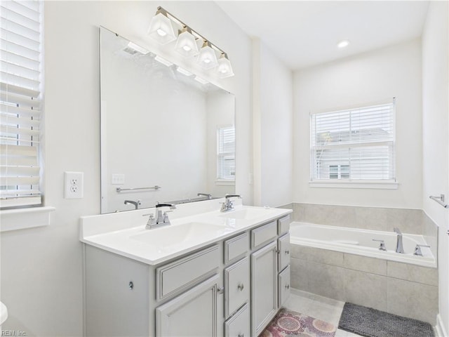 1732 Defiance Dr, Chesapeake, VA 23323 - full bathroom featuring a bath, double vanity, and tile patterned floors