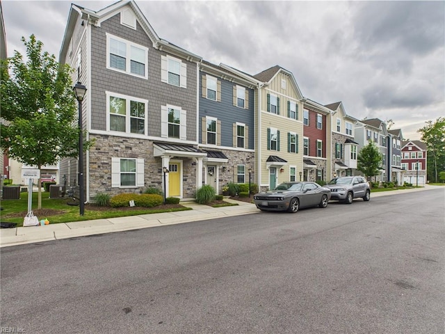 1732 Defiance Dr, Chesapeake, VA 23323 - view of property with stone siding and a residential view