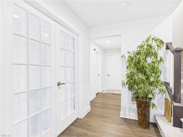 1732 Defiance Dr, Chesapeake, VA 23323 - corridor with wood finished floors, french doors, and recessed lighting
