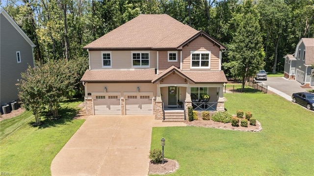102 Batten Cv, Carrollton, VA 23314 - craftsman house featuring concrete driveway, a garage, a porch, stone siding, and roof with shingles