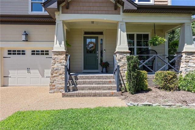102 Batten Cv, Carrollton, VA 23314 - doorway to property featuring covered porch