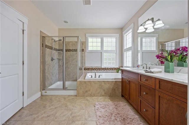 102 Batten Cv, Carrollton, VA 23314 - full bath featuring vanity, a bath, a stall shower, and tile patterned floors