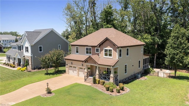 102 Batten Cv, Carrollton, VA 23314 - craftsman-style house with covered porch, a garage, concrete driveway, a shingled roof, and stone siding
