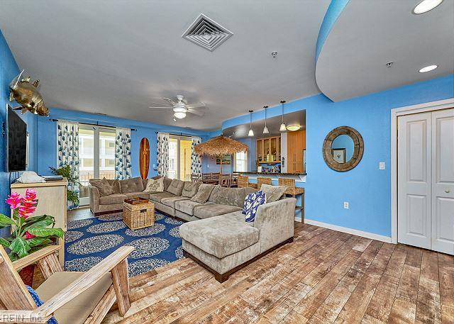 3738 Sandpiper Rd Unit 214B, Virginia Beach, VA 23456 - living room with a ceiling fan and wood finished floors