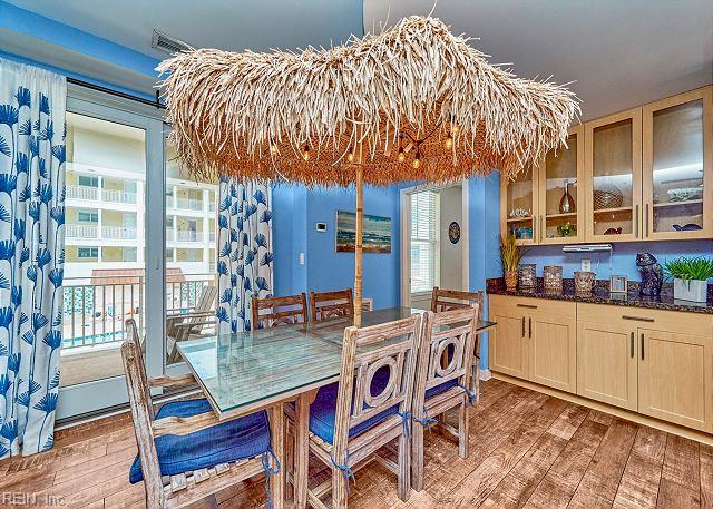 3738 Sandpiper Rd Unit 214B, Virginia Beach, VA 23456 - dining space featuring light wood-type flooring