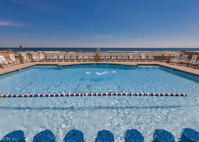 3738 Sandpiper Rd Unit 214B, Virginia Beach, VA 23456 - community pool with a patio area and a water view