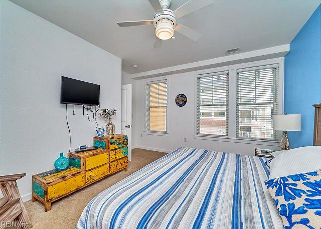 3738 Sandpiper Rd Unit 214B, Virginia Beach, VA 23456 - bedroom with carpet floors and ceiling fan