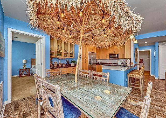 3738 Sandpiper Rd Unit 214B, Virginia Beach, VA 23456 - dining area featuring baseboards