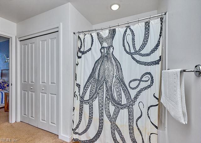 3738 Sandpiper Rd Unit 214B, Virginia Beach, VA 23456 - full bathroom with a shower with curtain and a closet