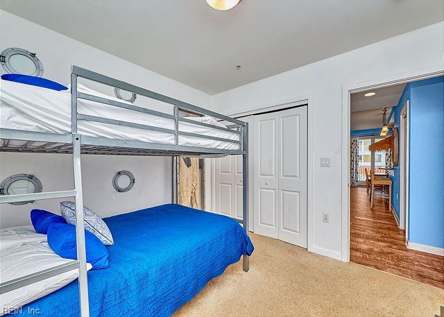 3738 Sandpiper Rd Unit 214B, Virginia Beach, VA 23456 - bedroom with carpet flooring and baseboards