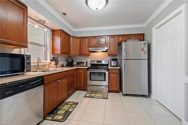 2025 Allison Dr, Chesapeake, VA 23325 - kitchen with appliances with stainless steel finishes, crown molding, under cabinet range hood, light countertops, and brown cabinetry