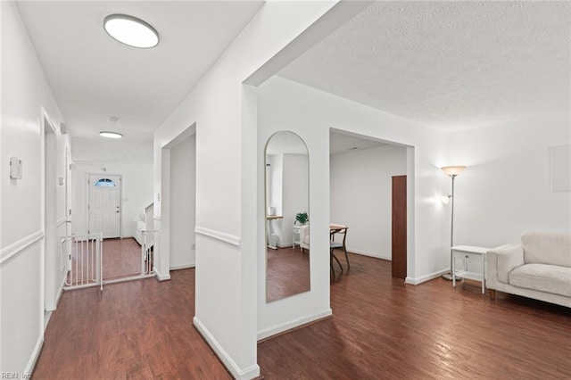 730 Kings Ridge Dr, Newport News, VA 23608 - hall featuring dark wood-type flooring and a textured ceiling
