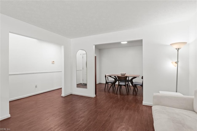 730 Kings Ridge Dr, Newport News, VA 23608 - living area with dark wood-style flooring and arched walkways