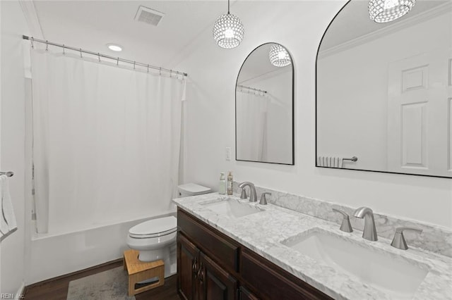 730 Kings Ridge Dr, Newport News, VA 23608 - bathroom featuring double vanity, crown molding, shower / bath combination with curtain, and wood finished floors