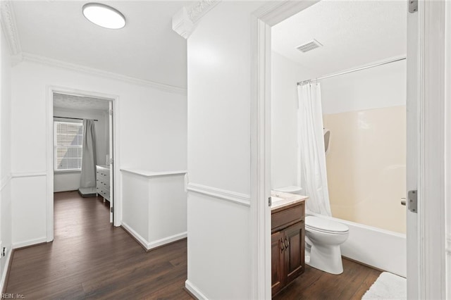 730 Kings Ridge Dr, Newport News, VA 23608 - bathroom featuring wood finished floors, vanity, shower / tub combo with curtain, and ornamental molding