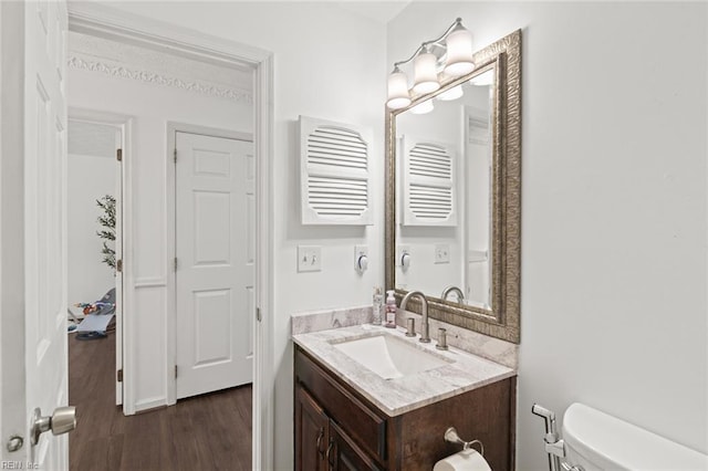 730 Kings Ridge Dr, Newport News, VA 23608 - half bathroom featuring vanity and wood finished floors