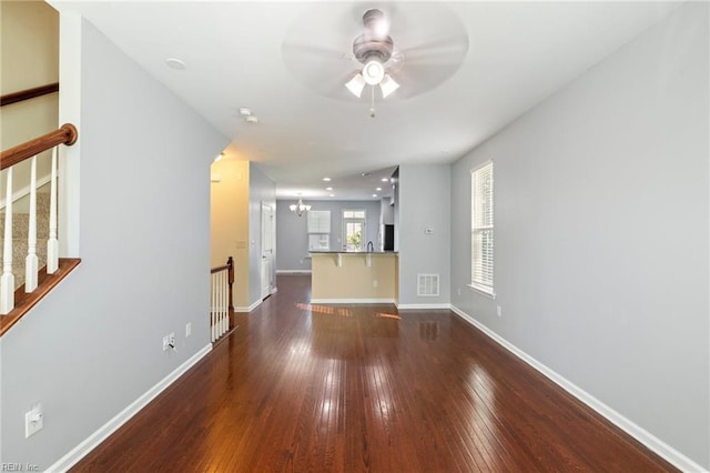 4371 Pickney Ln, Chesapeake, VA 23324 - unfurnished living room with ceiling fan, dark wood-style floors, and stairway