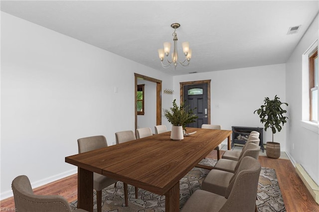 160 Outlaw Ln, Suffolk, VA 23435 - dining space with a chandelier and wood finished floors