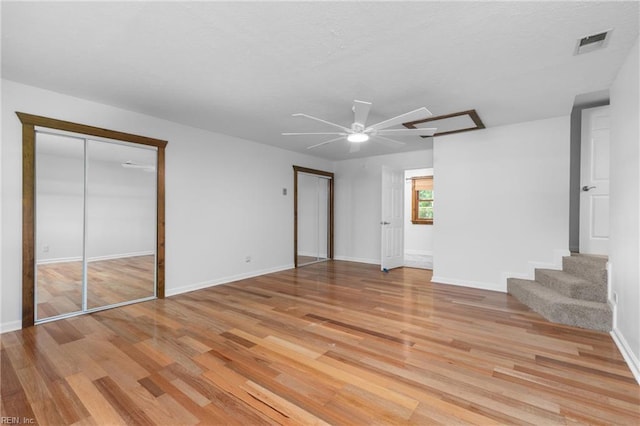 160 Outlaw Ln, Suffolk, VA 23435 - unfurnished bedroom featuring two closets, light wood-style floors, and ceiling fan