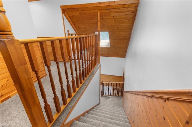 160 Outlaw Ln, Suffolk, VA 23435 - staircase with carpet flooring, wooden ceiling, and wainscoting