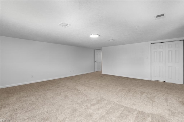 160 Outlaw Ln, Suffolk, VA 23435 - carpeted spare room with a textured ceiling and baseboards