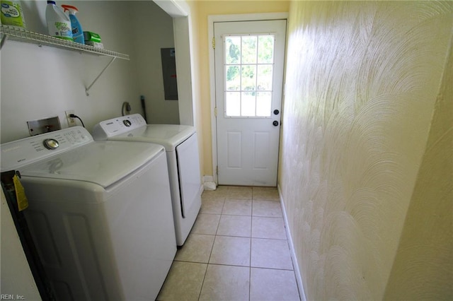 1353 King Arthur Dr, Chesapeake, VA 23323 - laundry area with washing machine and clothes dryer, electric panel, and light tile patterned floors