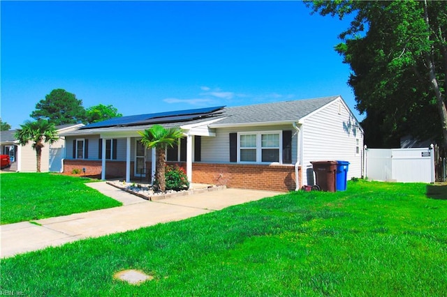1353 King Arthur Dr, Chesapeake, VA 23323 - ranch-style house with brick siding and solar panels