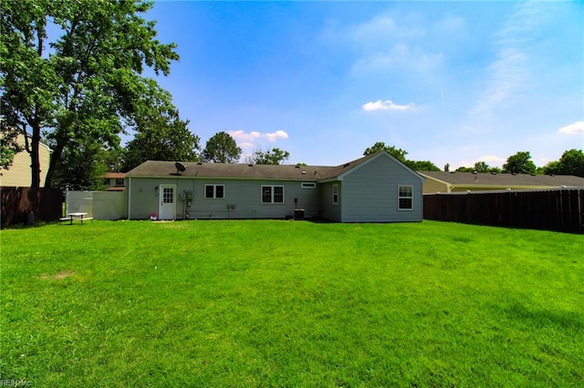 1353 King Arthur Dr, Chesapeake, VA 23323 - back of house with a fenced backyard