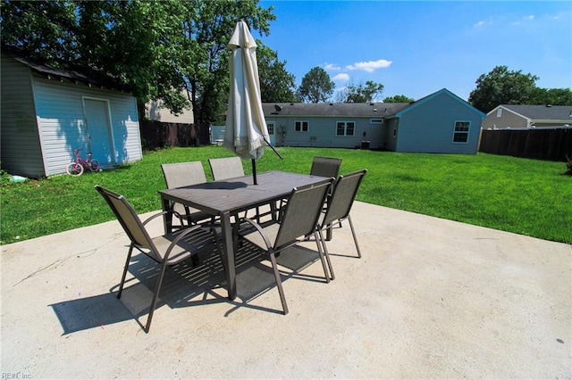 1353 King Arthur Dr, Chesapeake, VA 23323 - view of patio / terrace with outdoor dining area and a shed