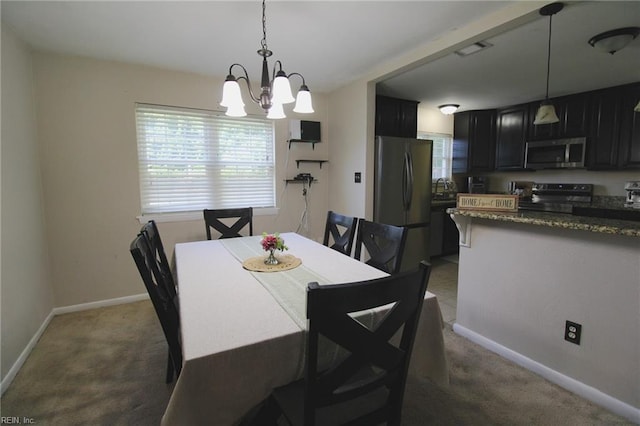 1353 King Arthur Dr, Chesapeake, VA 23323 - dining room featuring light carpet and a chandelier