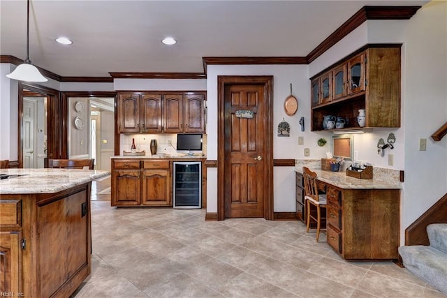 1217 Worthington Ln, Virginia Beach, VA 23464 - kitchen featuring beverage cooler, crown molding, light stone counters, glass insert cabinets, and hanging light fixtures