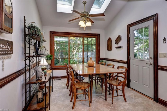 1217 Worthington Ln, Virginia Beach, VA 23464 - dining area featuring a skylight, plenty of natural light, lofted ceiling, ceiling fan, and light tile patterned floors