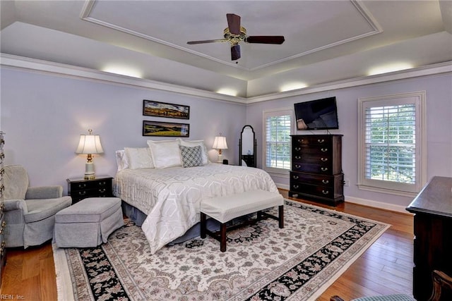 1217 Worthington Ln, Virginia Beach, VA 23464 - bedroom featuring a raised ceiling, wood finished floors, and ceiling fan