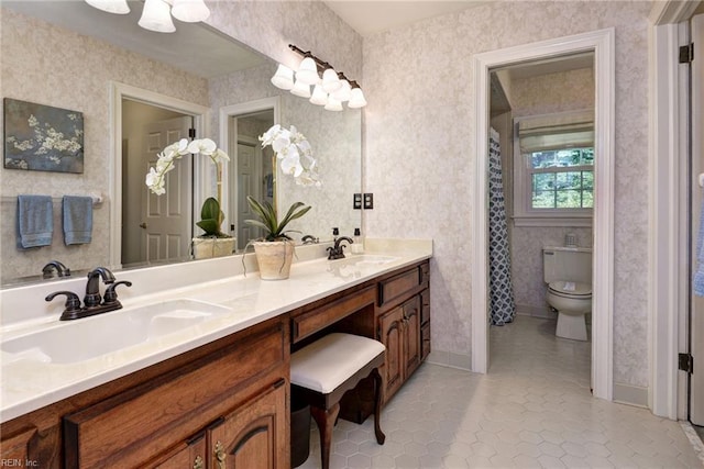 1217 Worthington Ln, Virginia Beach, VA 23464 - full bathroom featuring double vanity, wallpapered walls, and tile patterned floors