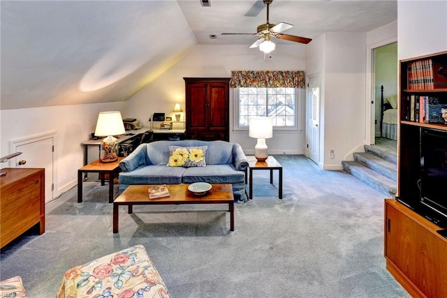 1217 Worthington Ln, Virginia Beach, VA 23464 - carpeted living room with vaulted ceiling, stairway, and ceiling fan