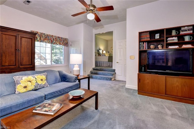 1217 Worthington Ln, Virginia Beach, VA 23464 - carpeted living area with a ceiling fan and stairs